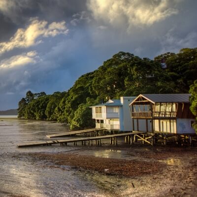 house on the beach at sunset