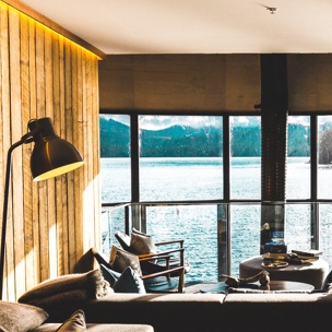 room with a window overlooking the ocean